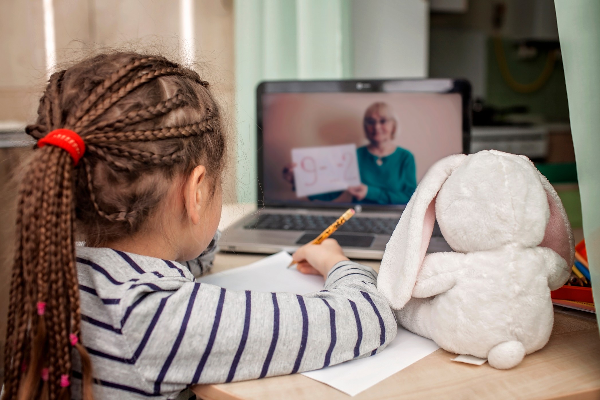 pretty-stylish-schoolgirl-studying-math-during-her-online-lesson-at-home-self-isolation-pupil_t20_e9KNOK